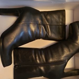 Nine West black leather boots. Size 7 1/2 genuine leather. 8" heel to top